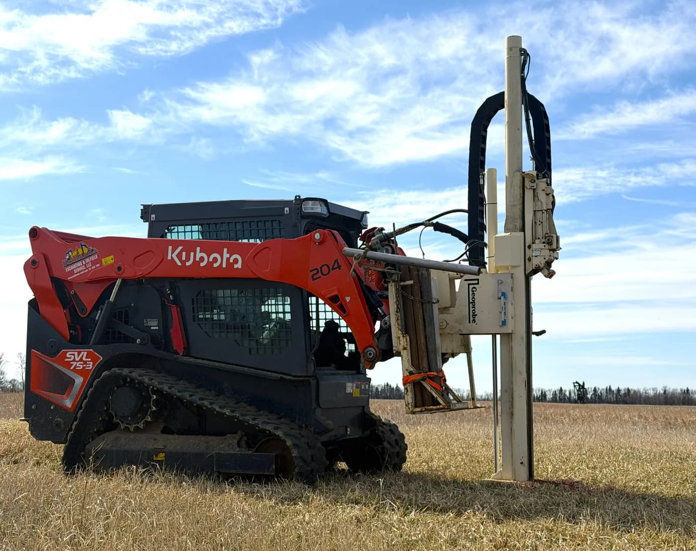 Summit's track-mounted push-probe rig in a field