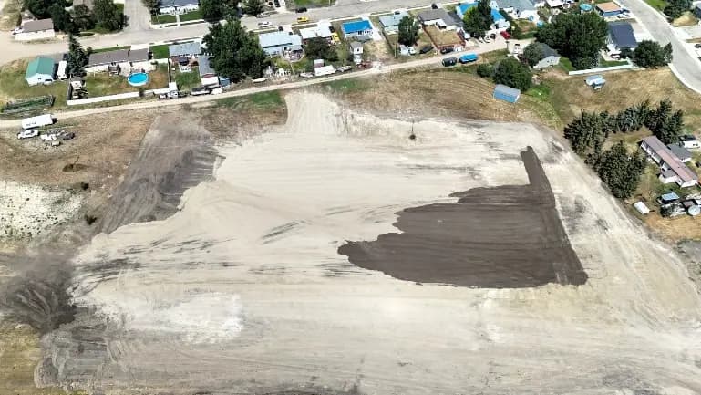 Aerial view of the Tioga soccer complex under construction, the town behind it.